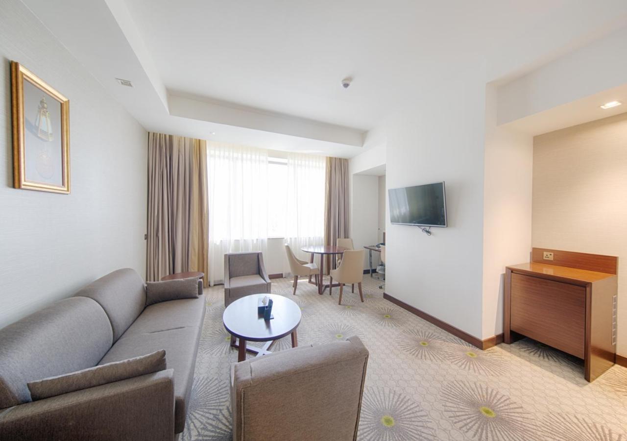 Holiday Suites Al Azizia Mekka Eksteriør bilde A room at the hotel
