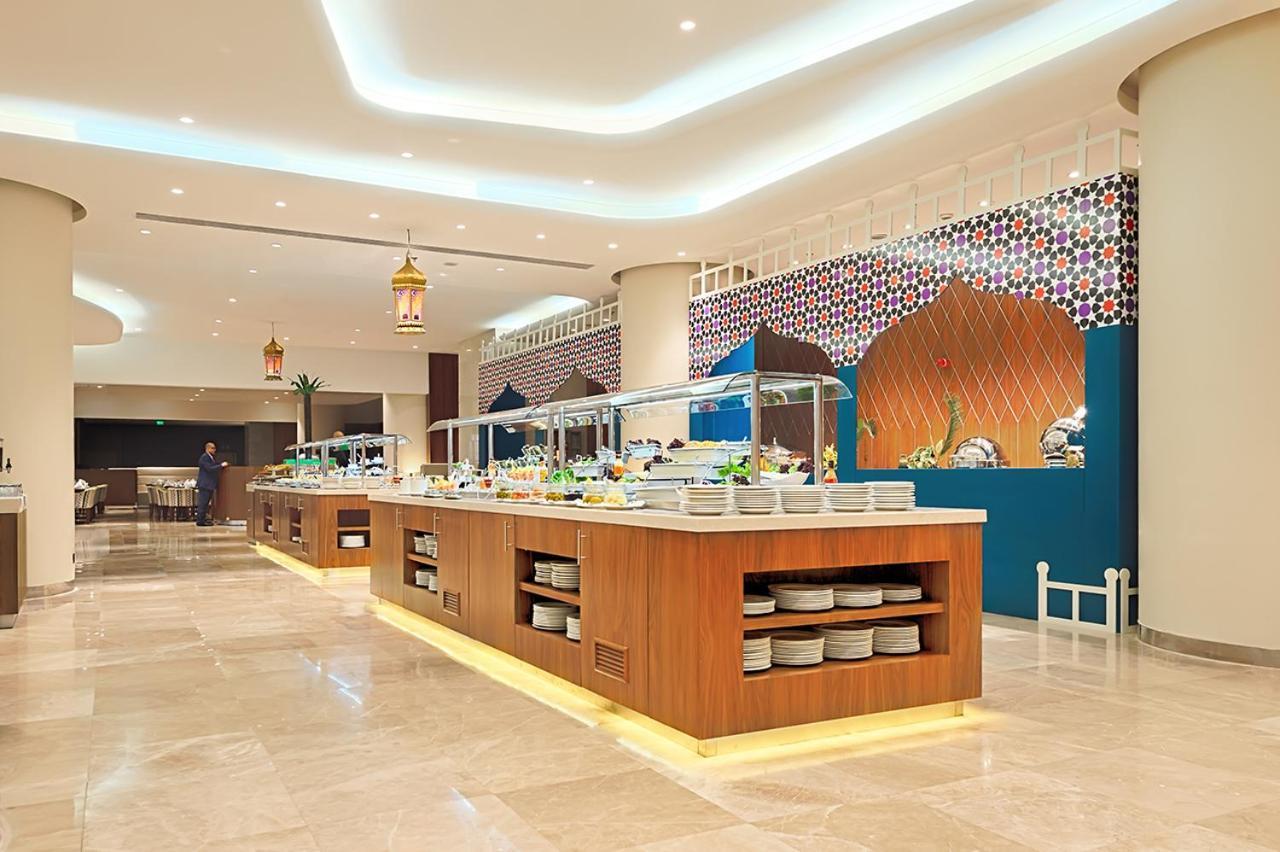 Holiday Suites Al Azizia Mekka Eksteriør bilde The hotel's restaurant